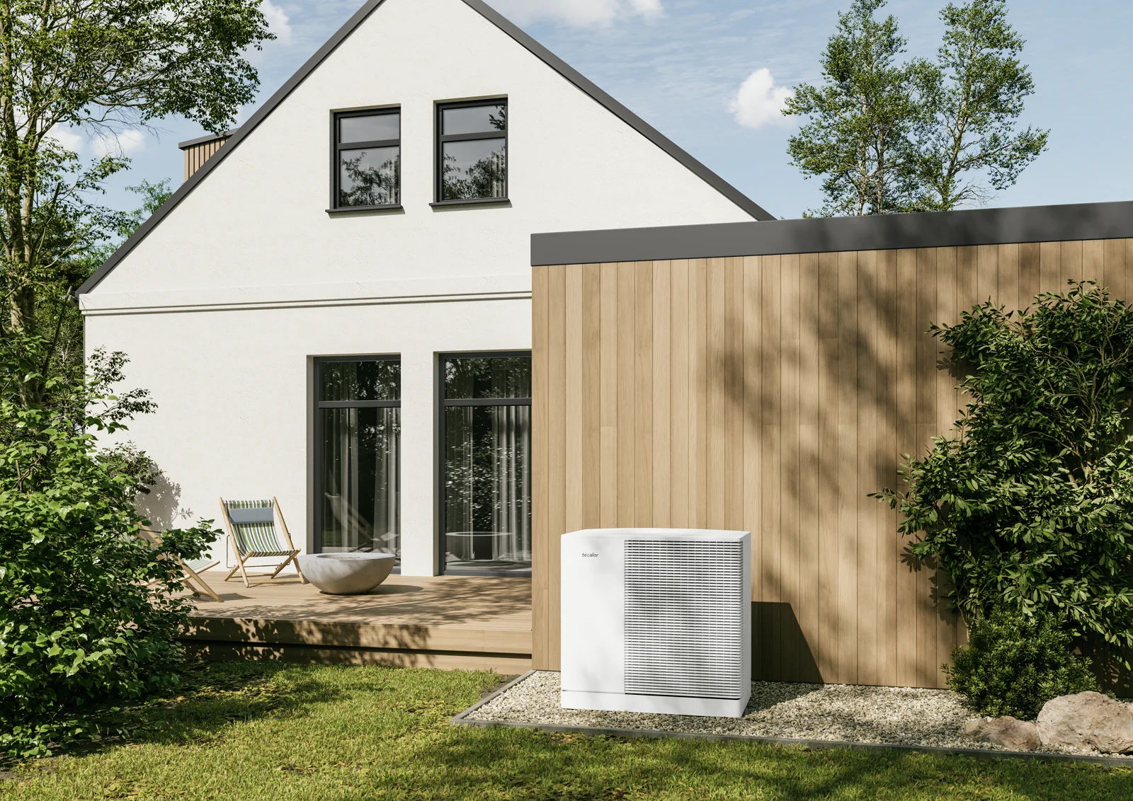 Modernes Wohnhaus mit tecalor Außengerät in der Gartenzone